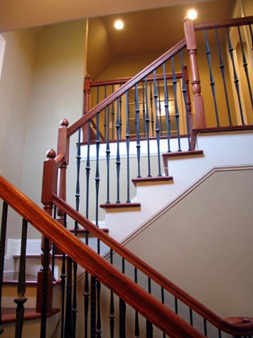 Create an Interesting and Dynamic Staircase with Wrought Iron Balusters - Stair Parts USA